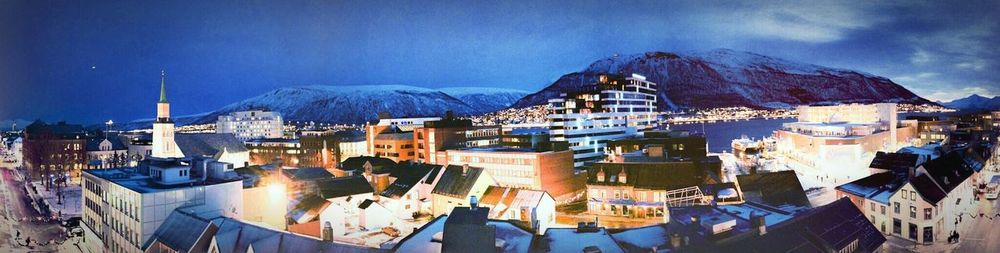 Panoramic view of town against sky