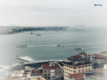 High angle view of town by sea