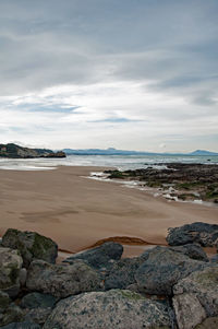 Scenic view of beach against sky