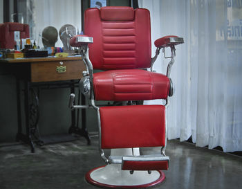 Empty chairs and tables in kitchen