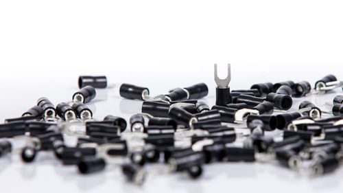 Close-up of objects on table against white background