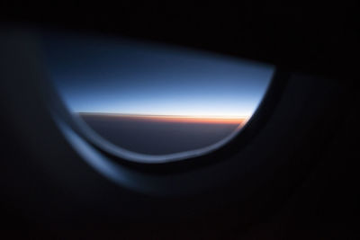 Close-up of airplane against sky