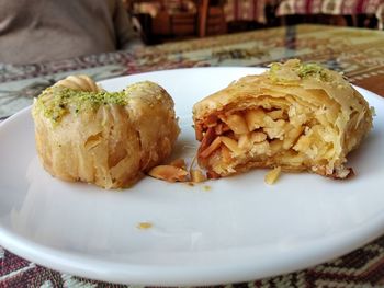 Close-up of bread in plate on table