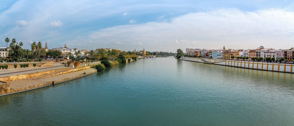 Bridge over river against sky