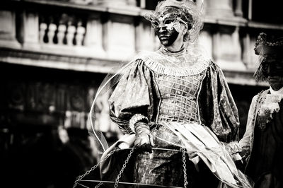 Man wearing mask at carnival festival