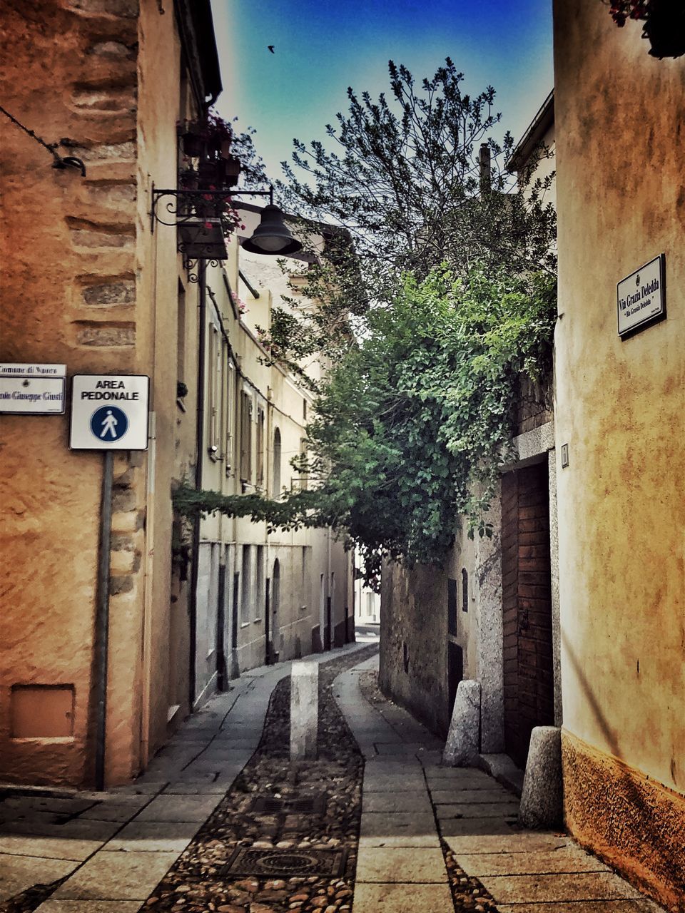 NARROW STREET BETWEEN BUILDINGS IN TOWN