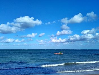 Boat sailing in sea