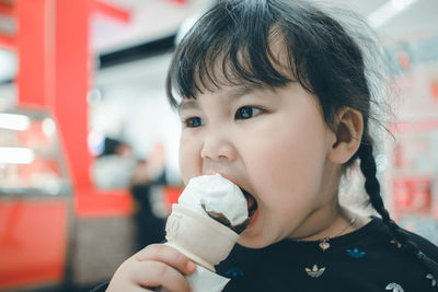 Portrait of boy eating ice cream