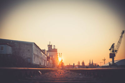 Silhouette of built structure at sunset