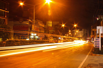 Light trails on city street at night