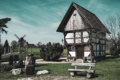 Built structure on land against sky