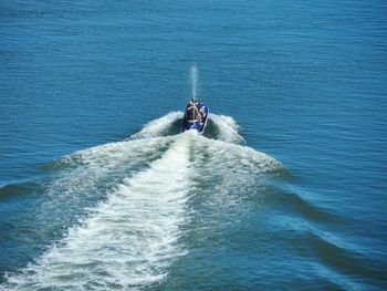 High angle view of man surfing in sea