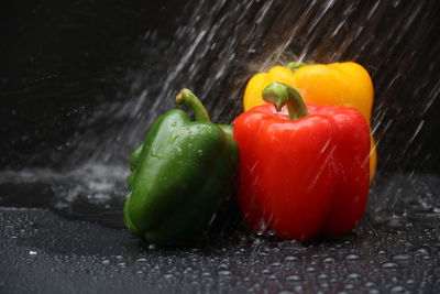 Close-up of wet red bell peppers