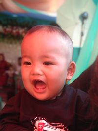 Cute baby boy with mouth open