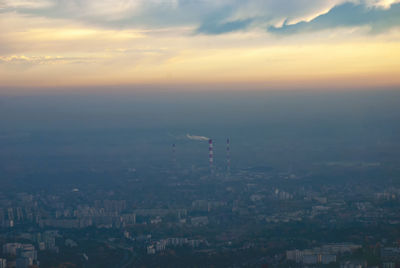 High angle view of townscape against sky during sunset