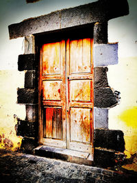 Closed door of old house