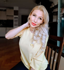 Portrait of teenage girl at home