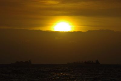 Scenic view of sea at sunset