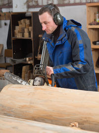 Carpenter working on wood