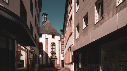 Low angle view of illuminated buildings against sky