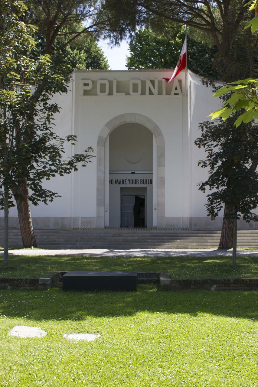 VIEW OF LAWN AND BUILDING