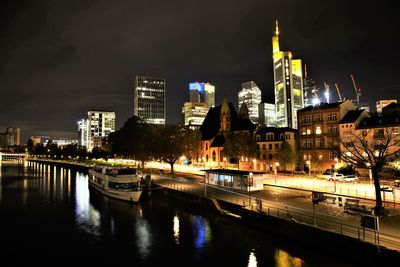 Illuminated buildings in city at night