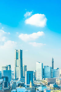 Modern buildings in city against sky