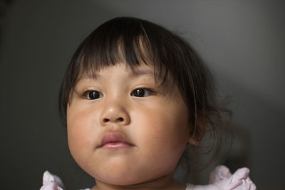 Close-up portrait of cute girl