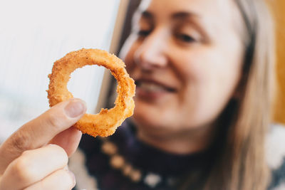 Close-up of woman holding food