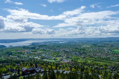 Aerial view of townscape against sky