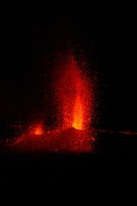 Close-up of illuminated lights at night