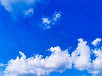 Low angle view of clouds in blue sky