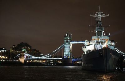 View of suspension bridge at night