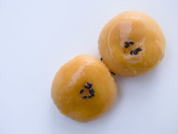 Close-up of fruits against white background