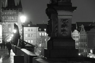 Buildings in city at night