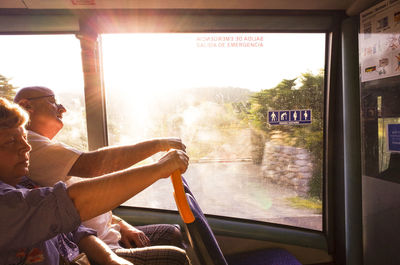 Man sitting in train