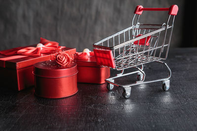 Close-up of red container on table