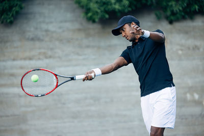 Man playing tennis