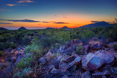 Scenic view of mountains against sky during sunset