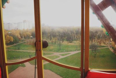 Scenic view of landscape seen through window