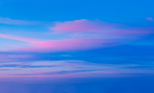 Low angle view of dramatic sky during sunset