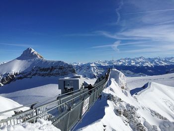 Snow covered mountains against sky