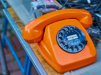 High angle view of telephone booth on table