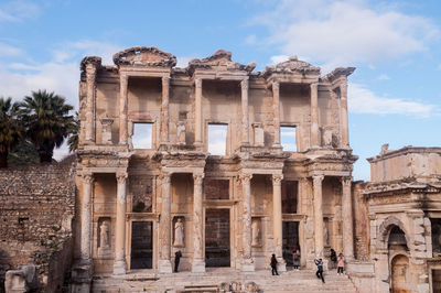 View of historical building against cloudy sky