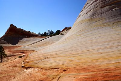 Scenic view of desert against clear sky