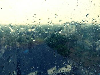 Close-up of water drops on window