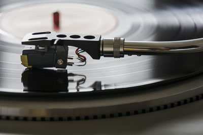 Close-up of turntable on table