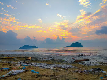 Scenic view of sea against sky during sunset