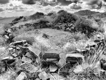 Scenic view of landscape against cloudy sky