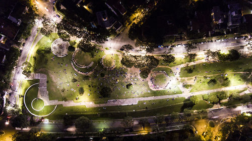 Aerial view of illuminated cityscape at night